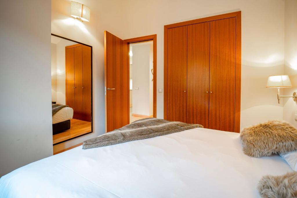 Postel nebo postele na pokoji v ubytování Apartaments Superior