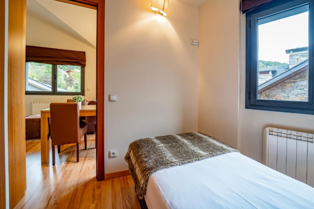 Postel nebo postele na pokoji v ubytování Apartaments Superior