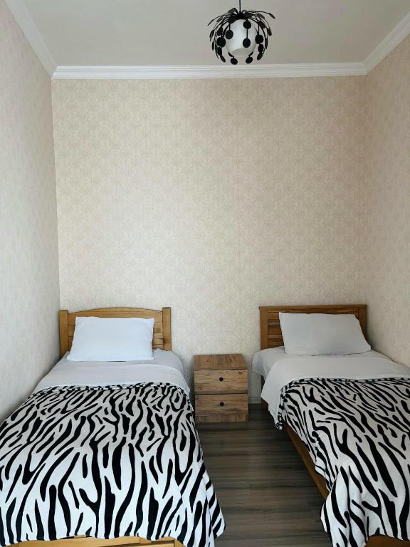 Postel nebo postele na pokoji v ubytování Lagostar