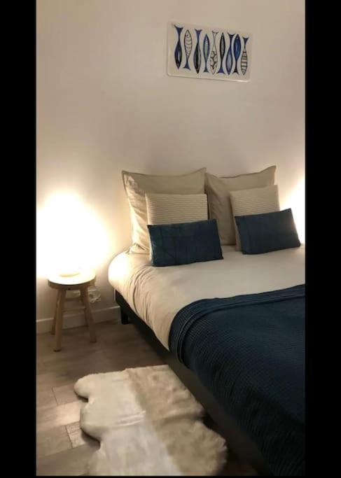 Postel nebo postele na pokoji v ubytování L'Escale Marine