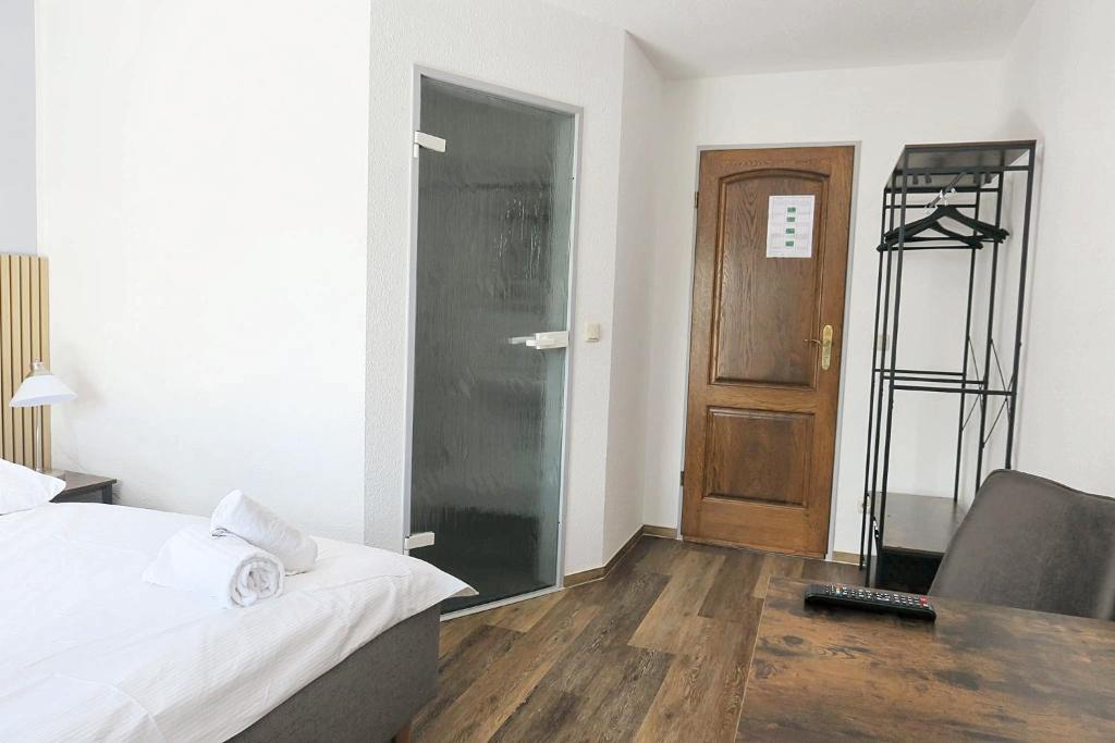 Postel nebo postele na pokoji v ubytování Hotel Marina