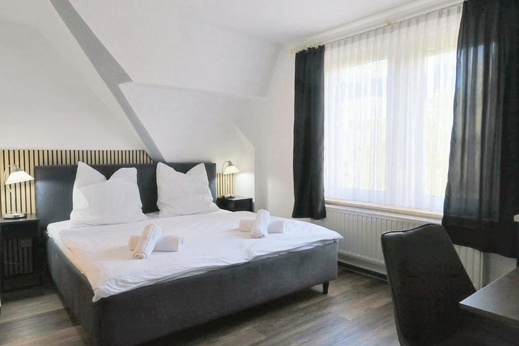 Postel nebo postele na pokoji v ubytování Hotel Marina