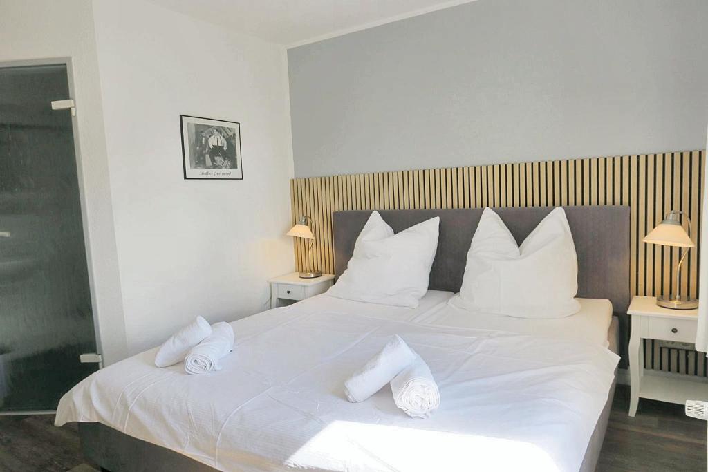 Postel nebo postele na pokoji v ubytování Hotel Marina