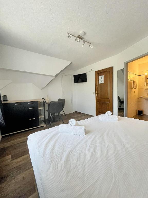 Postel nebo postele na pokoji v ubytování Hotel Marina