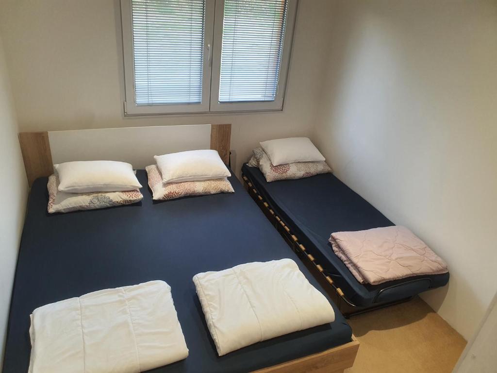 Postel nebo postele na pokoji v ubytování Chata Dolní Bušínov