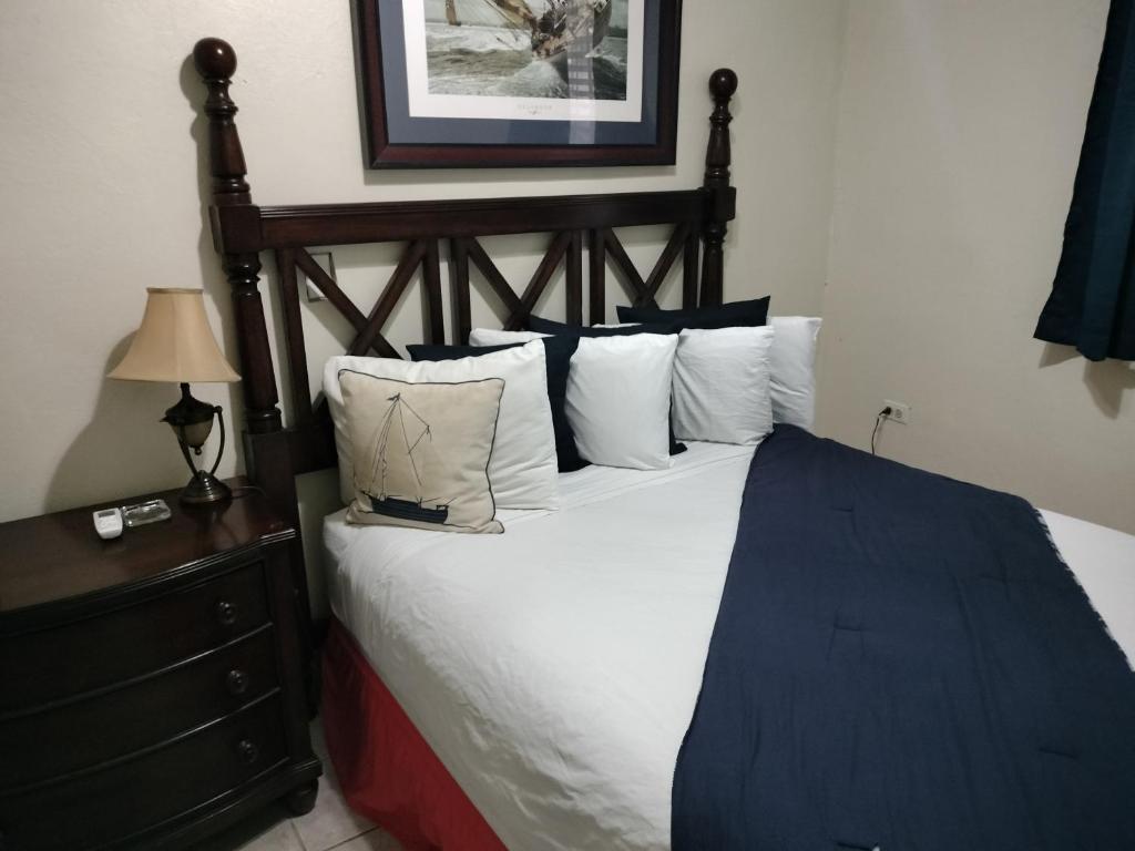 Postel nebo postele na pokoji v ubytování Casa de Tortuga Guesthouse