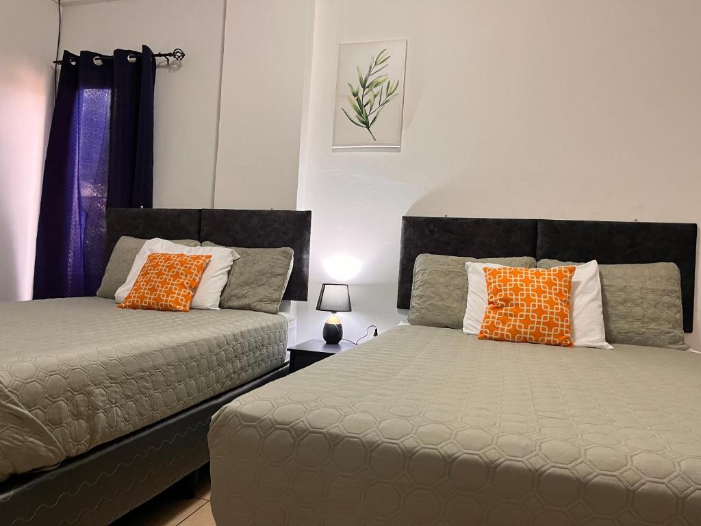 Postel nebo postele na pokoji v ubytování Apartamentos Trebol