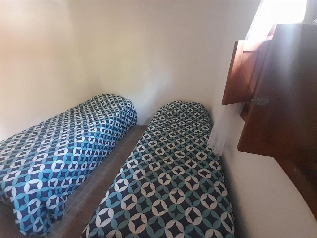 Postel nebo postele na pokoji v ubytování Tiny house florestinha