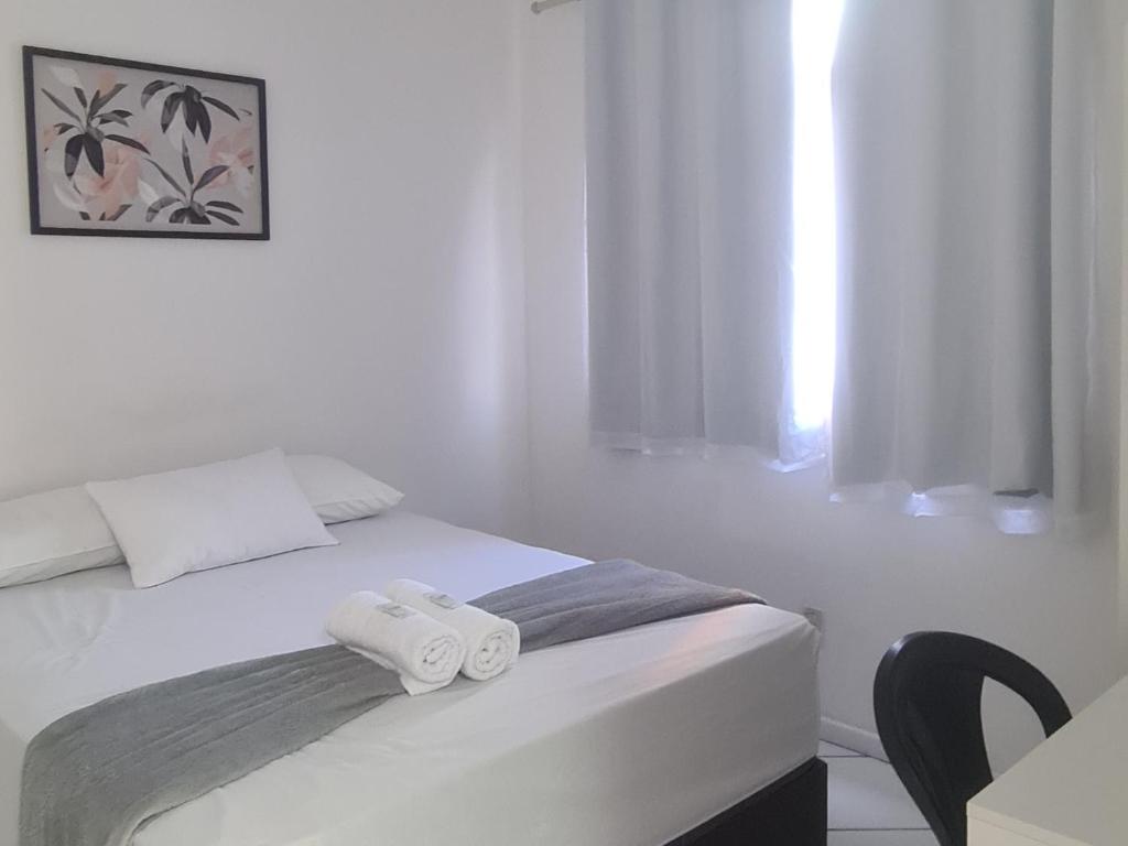 Postel nebo postele na pokoji v ubytování Hotel Aconchegante