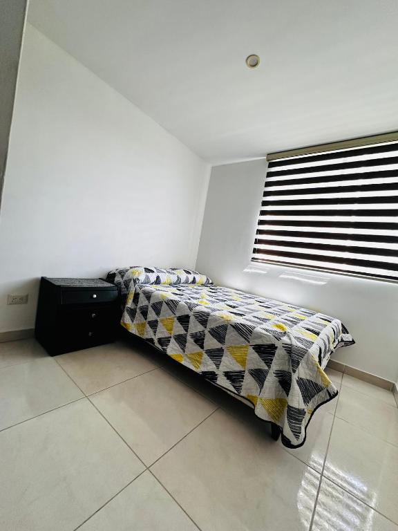 Postel nebo postele na pokoji v ubytování El rincón de Tonella Apartamento completo muy equipado