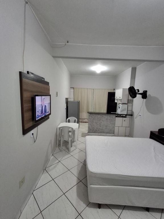 Televisyen dan/atau pusat hiburan di hotel Pousada Gomes