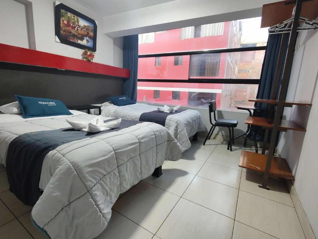 Postel nebo postele na pokoji v ubytování Hotel Platinum Palace