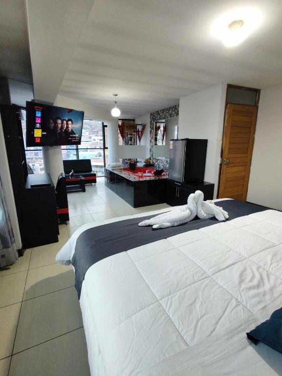 Postel nebo postele na pokoji v ubytování Hotel Platinum Palace
