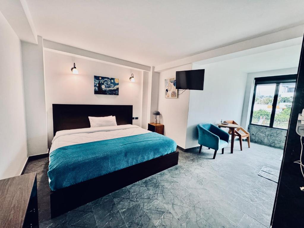 Postel nebo postele na pokoji v ubytování Royal Rest Imbabura