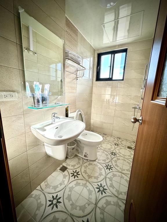 Koupelna v ubytování Huatian B&B