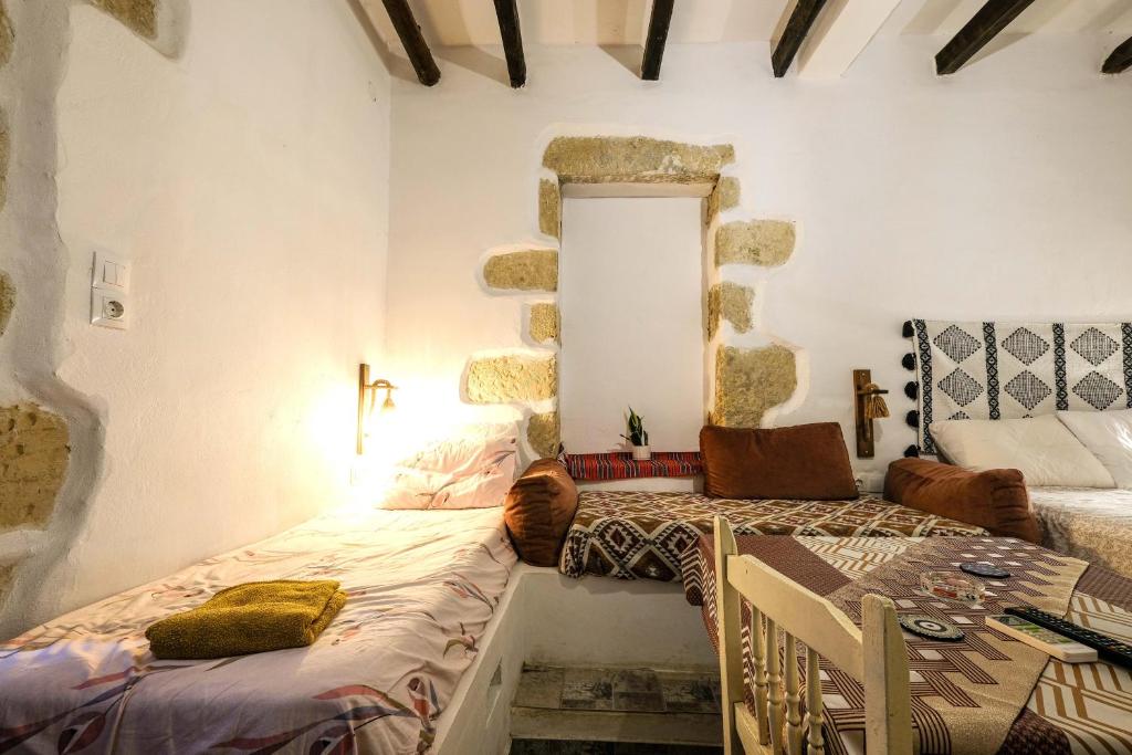 Postel nebo postele na pokoji v ubytování Vryses Crete-Village Vibes