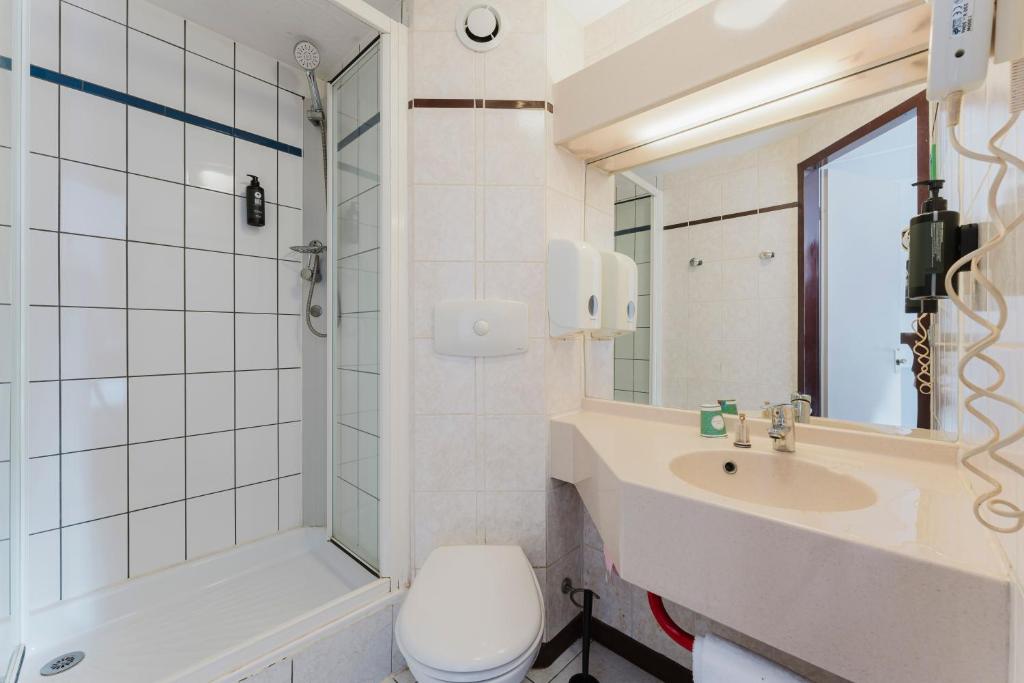 Koupelna v ubytování Cap Hôtel