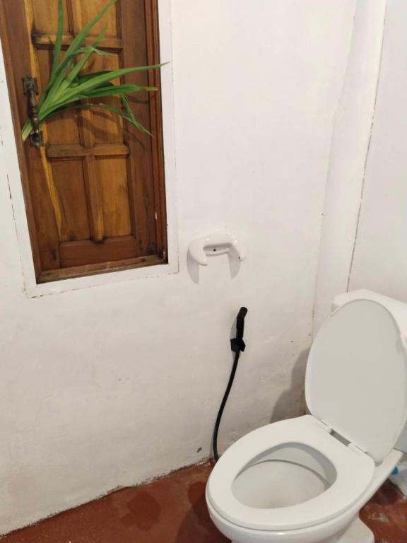Koupelna v ubytování Tiki Bar-KanTiang Guesthouse