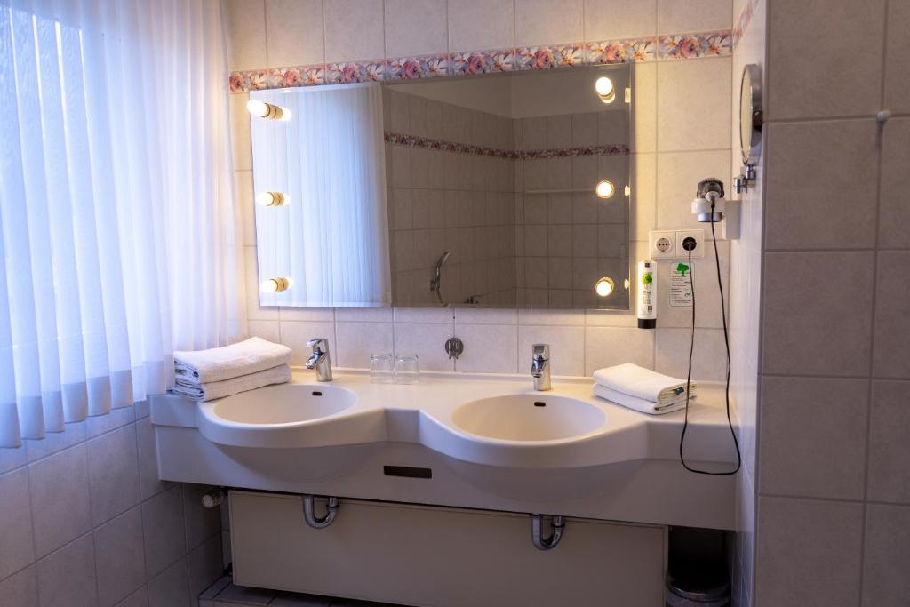 Koupelna v ubytování Hotel Klusenhof