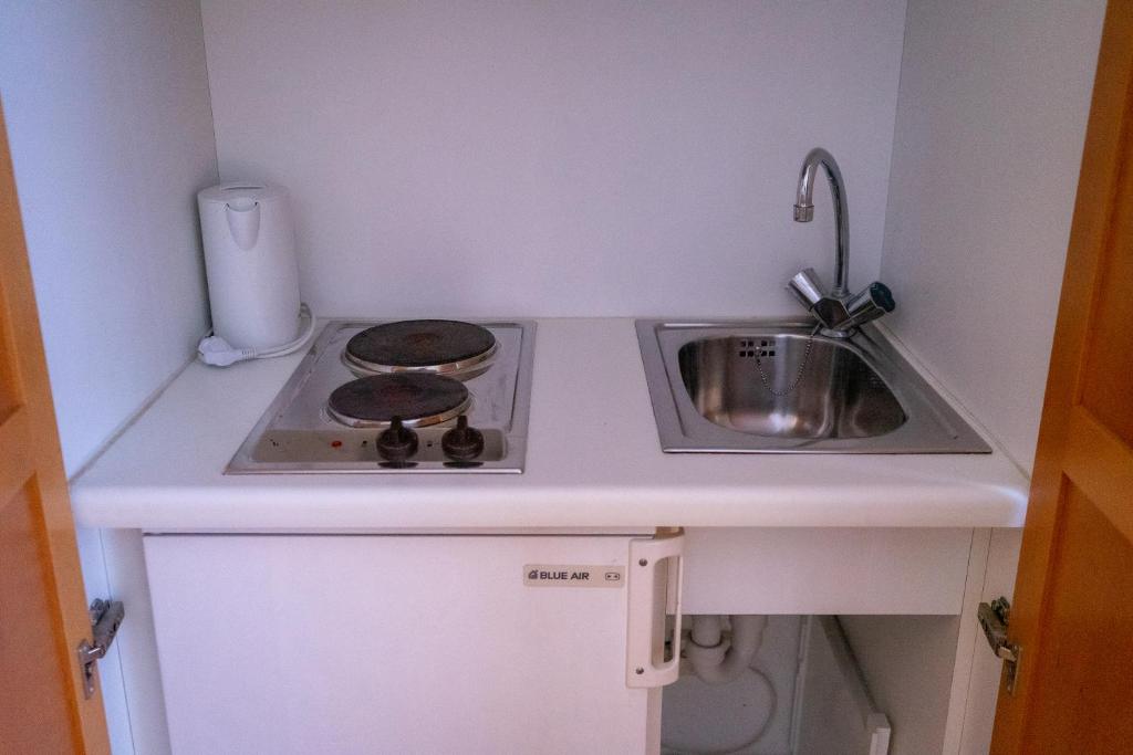 Kuchyň nebo kuchyňský kout v ubytování Hotel Klusenhof