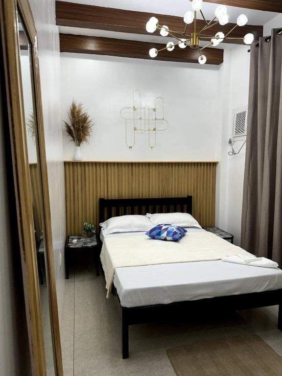 Ένα ή περισσότερα κρεβάτια σε δωμάτιο στο Ohwa's Guesthouse