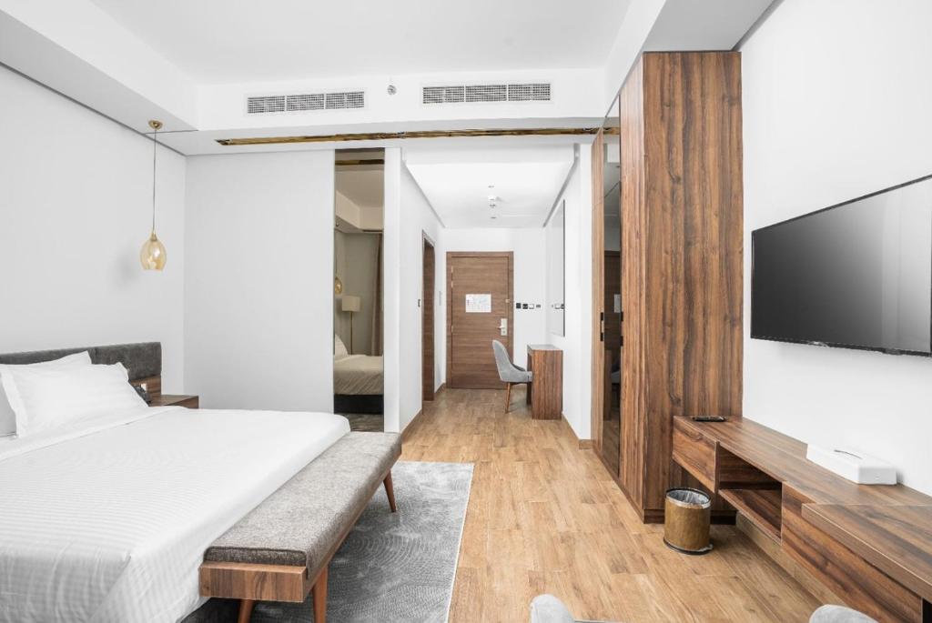 Postel nebo postele na pokoji v ubytování AKASIYA HOTEL