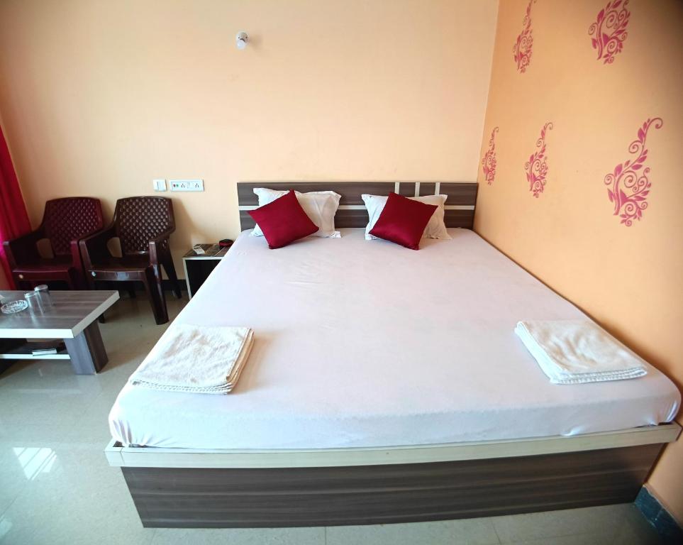 Postel nebo postele na pokoji v ubytování Rose Beach Resort