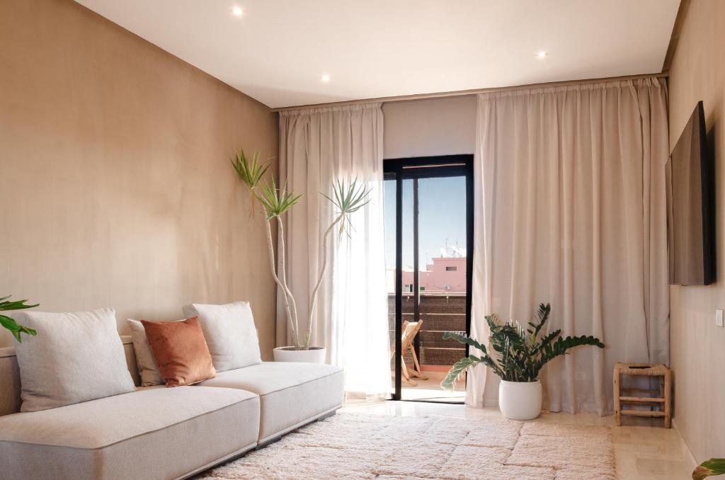 Χώρος καθιστικού στο Large Stylish Condo Central Gueliz with Pool Access