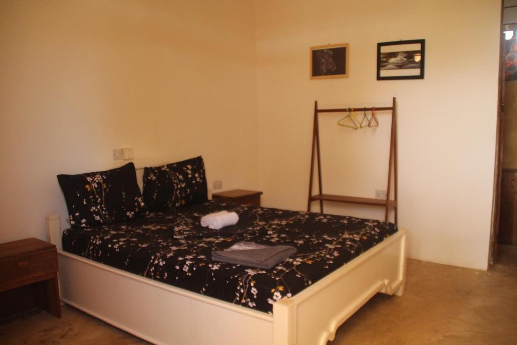 Postel nebo postele na pokoji v ubytování Raphy Home