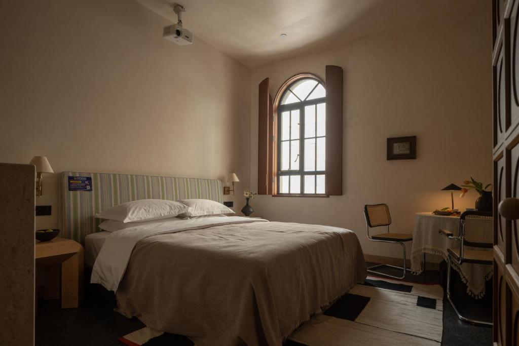 Postel nebo postele na pokoji v ubytování 归相Golden Age酒店