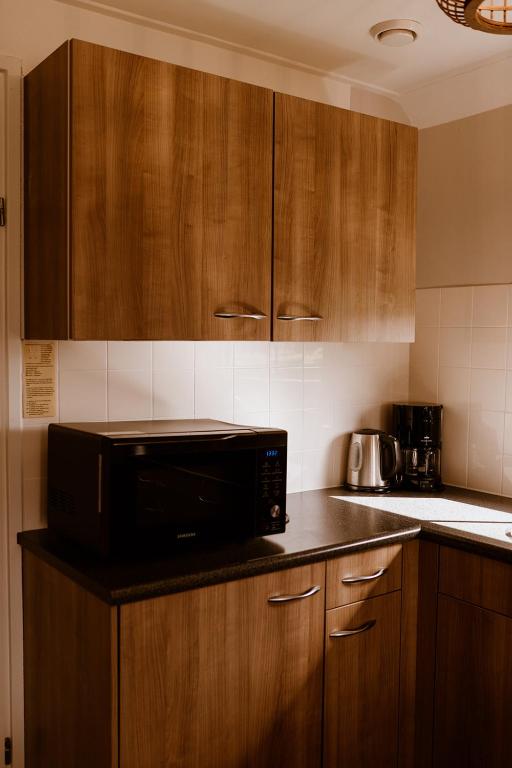 Kuchyň nebo kuchyňský kout v ubytování Vakantiepark Eigen Wijze
