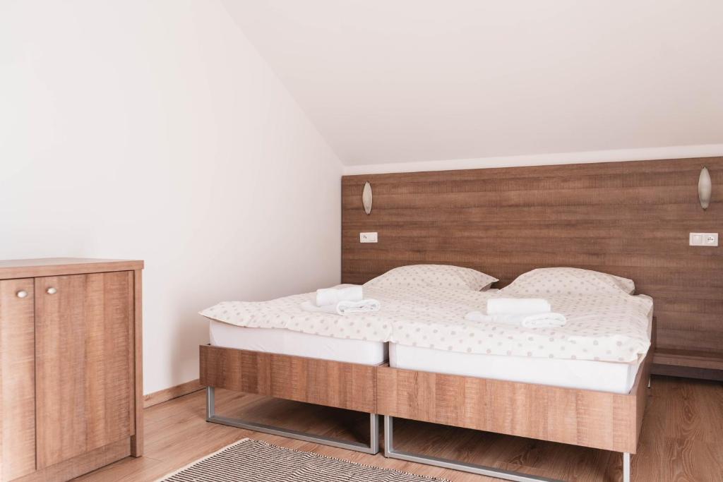Postel nebo postele na pokoji v ubytování Orava Village