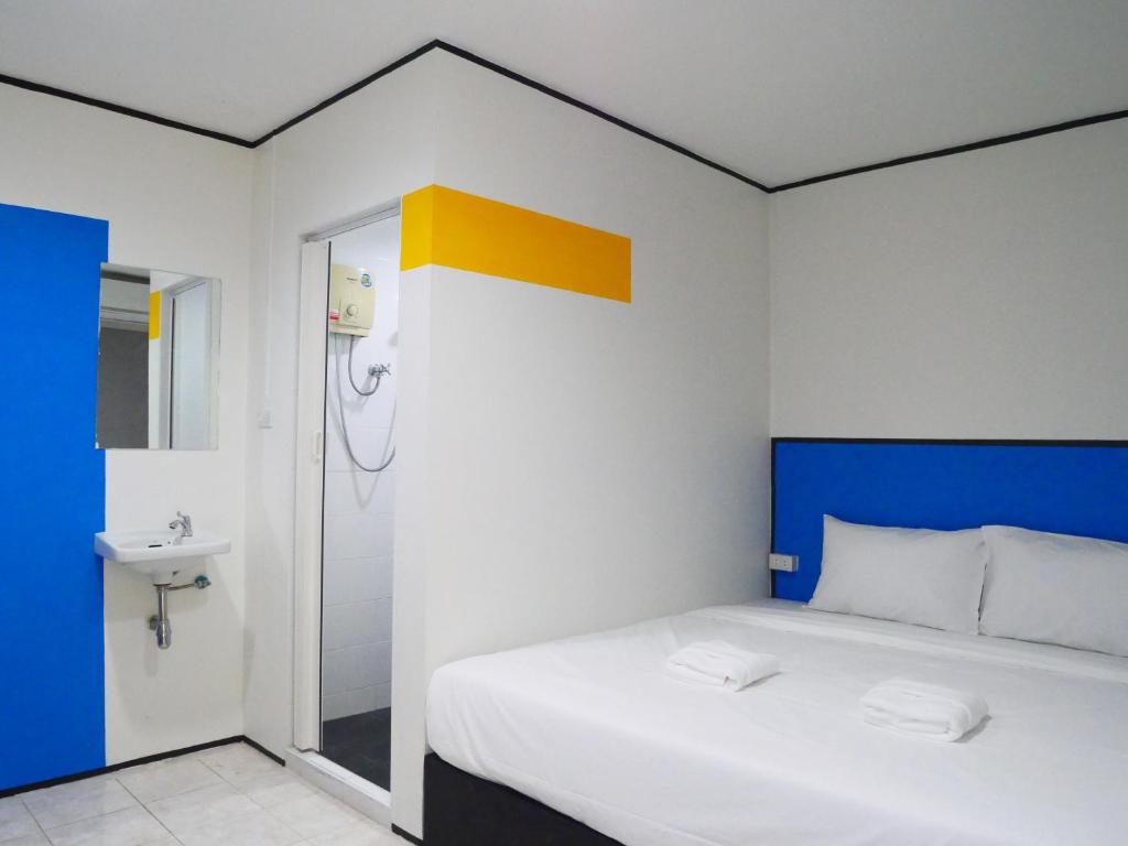 Postel nebo postele na pokoji v ubytování RYB Hostel Phuket