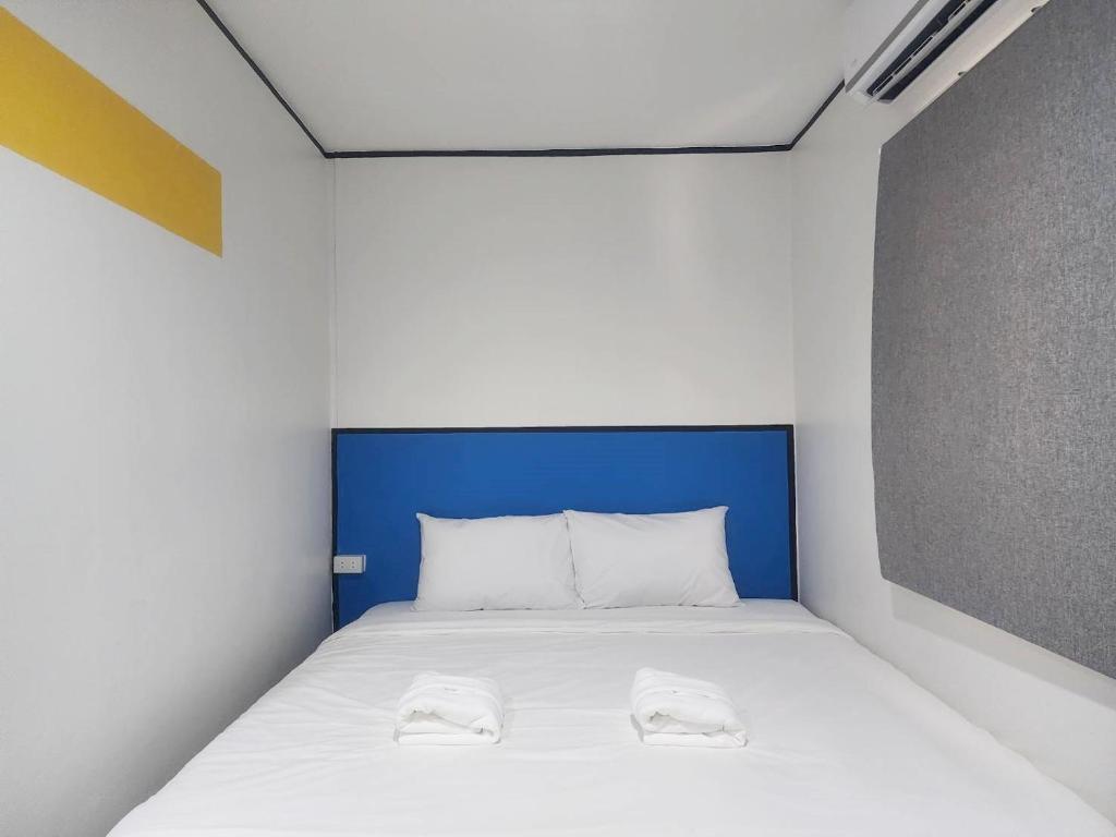 Postel nebo postele na pokoji v ubytování RYB Hostel Phuket