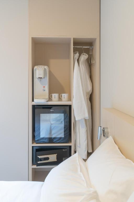 Postel nebo postele na pokoji v ubytování Hotel Myeongdongjang
