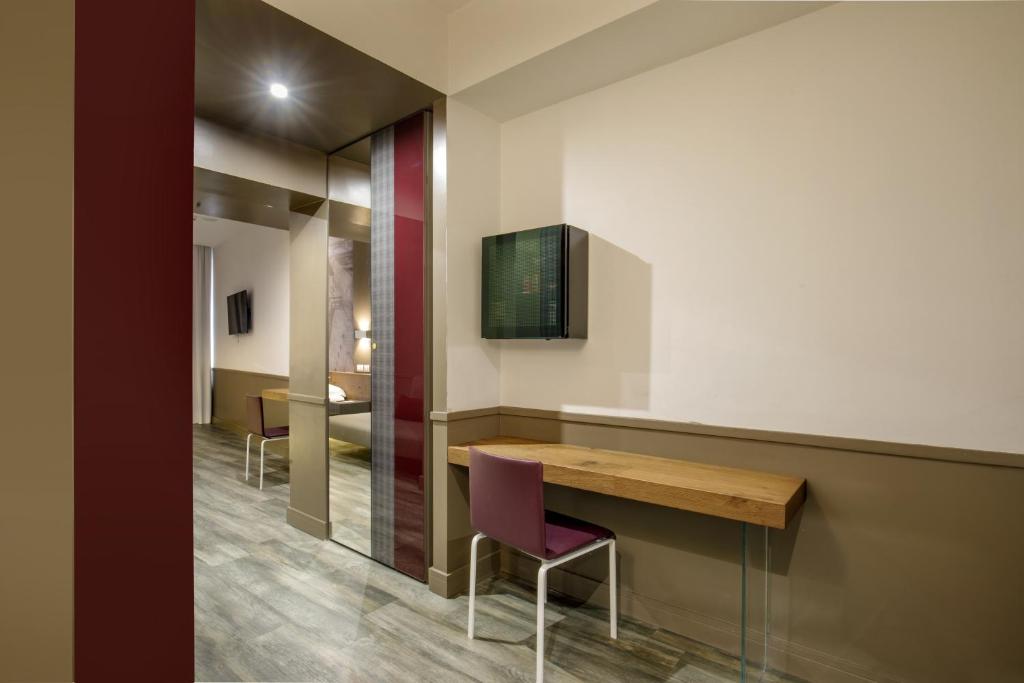 TV a/nebo společenská místnost v ubytování Hotel Regno