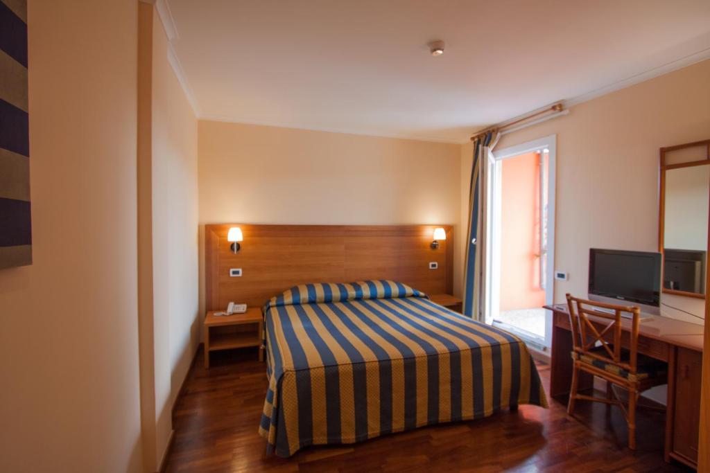 Cama o camas de una habitación en Hotel Laurentia