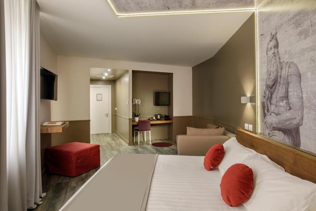 Postel nebo postele na pokoji v ubytování Hotel Regno