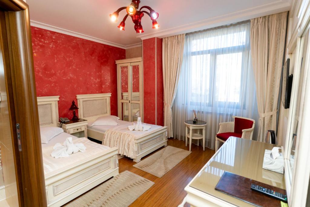 Postel nebo postele na pokoji v ubytování Acapulco Hotel