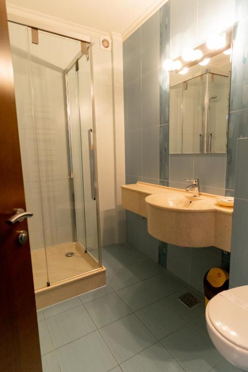 Koupelna v ubytování Acapulco Hotel