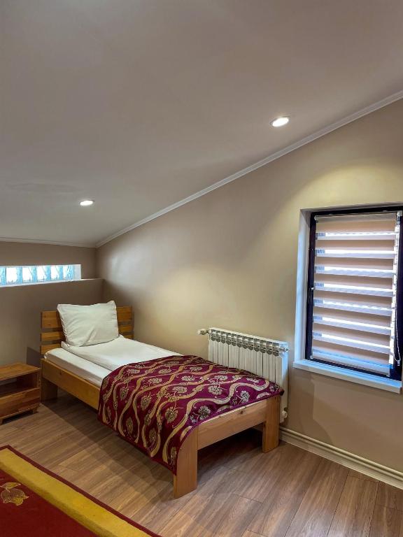 Postel nebo postele na pokoji v ubytování Hotel Berr