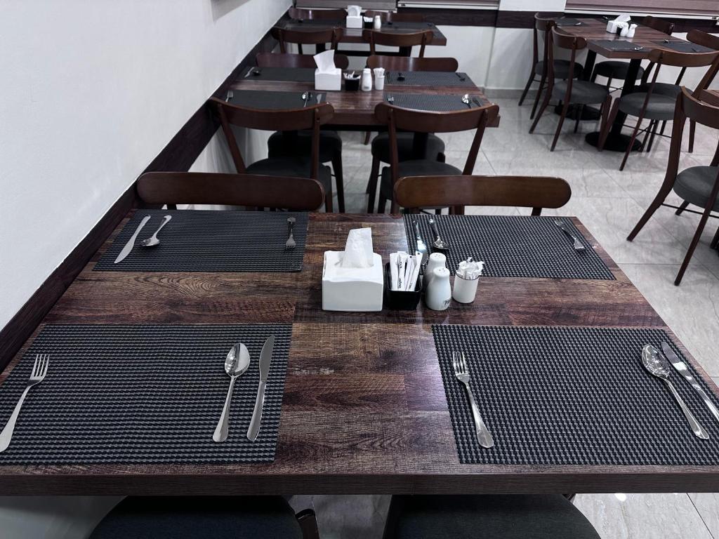 Restauracja lub miejsce do jedzenia w obiekcie TAJ Hotel