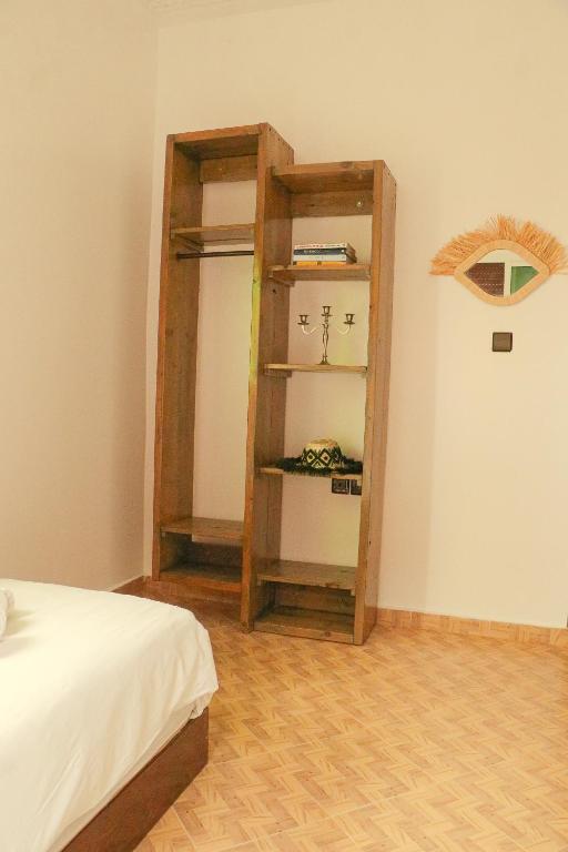 Postel nebo postele na pokoji v ubytování cactus surf experience