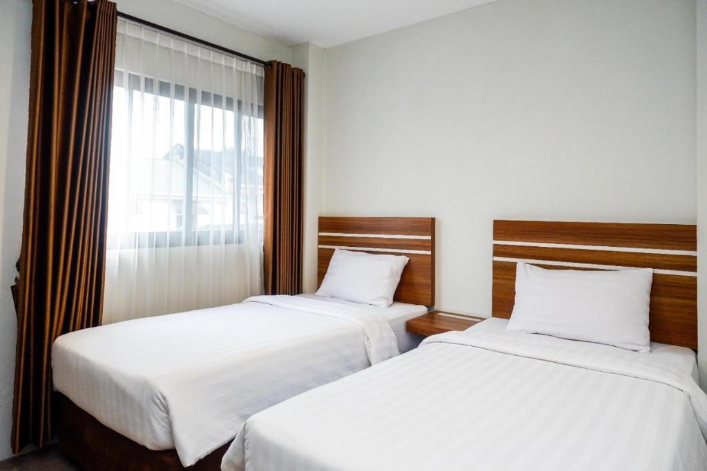 Nostos Guesthouse Wonosobo - Quarto Twin Superior