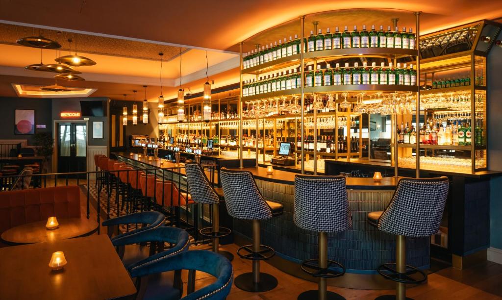 Lounge nebo bar v ubytování Grand Canal Hotel