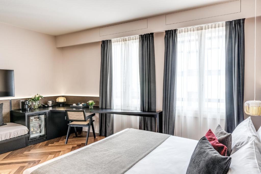 Postel nebo postele na pokoji v ubytování Plinius Lifestyle Hotel Lake Como