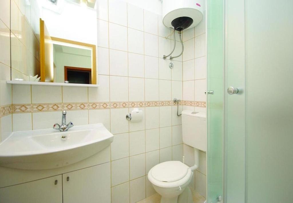 Kúpeľňa v ubytovaní Apartments and Rooms Ljuba