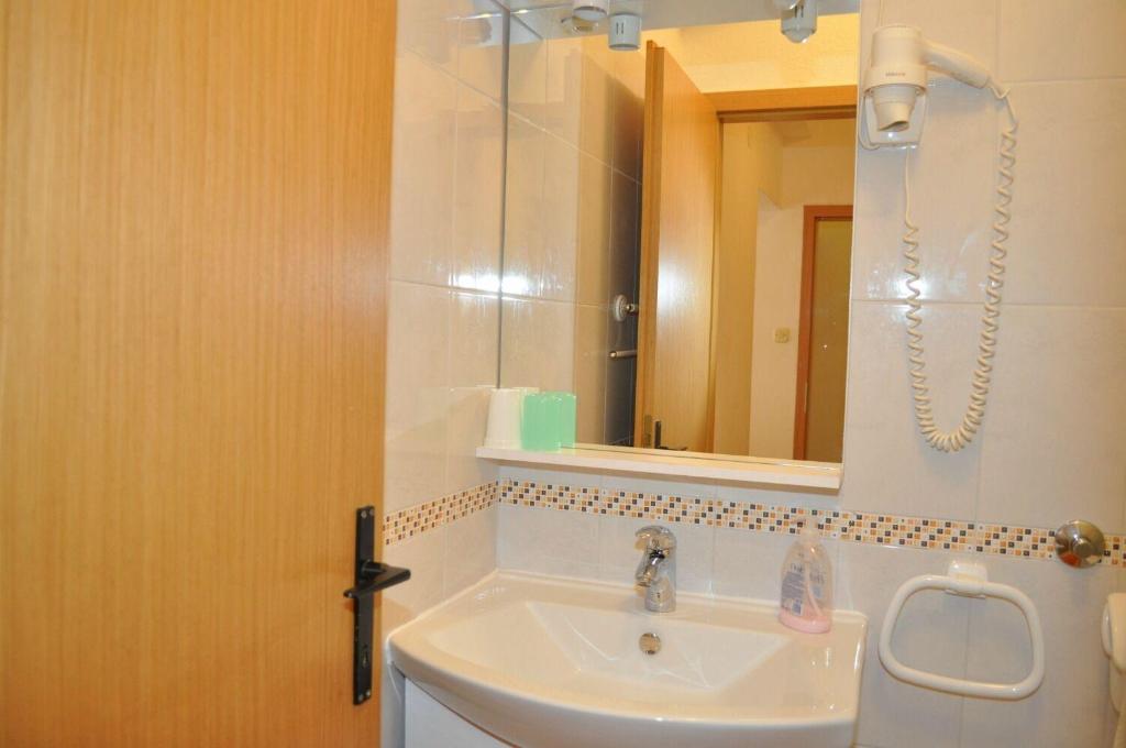 Kúpeľňa v ubytovaní Apartments and Rooms Ljuba