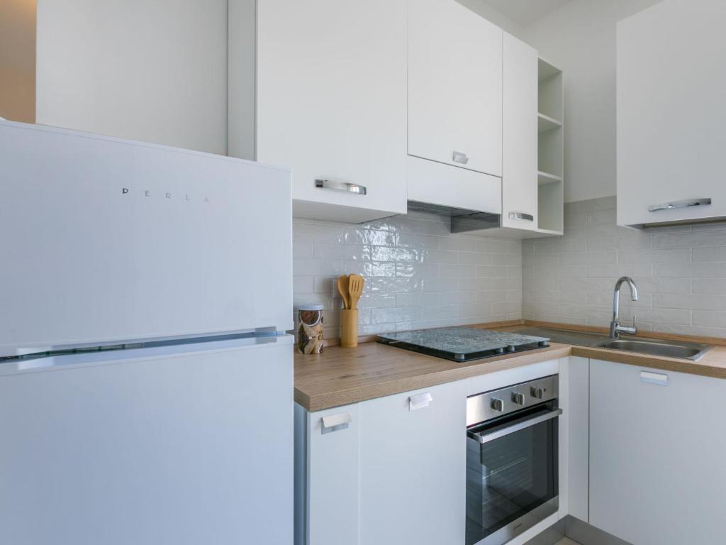 Kuchyň nebo kuchyňský kout v ubytování Apartment Mauro by Interhome