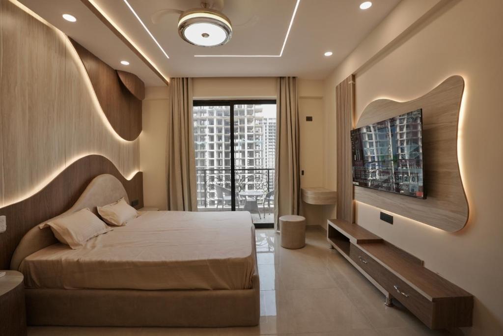 Μια τηλεόραση ή/και κέντρο ψυχαγωγίας στο Villa Vistosa Omaxe Hazratganj